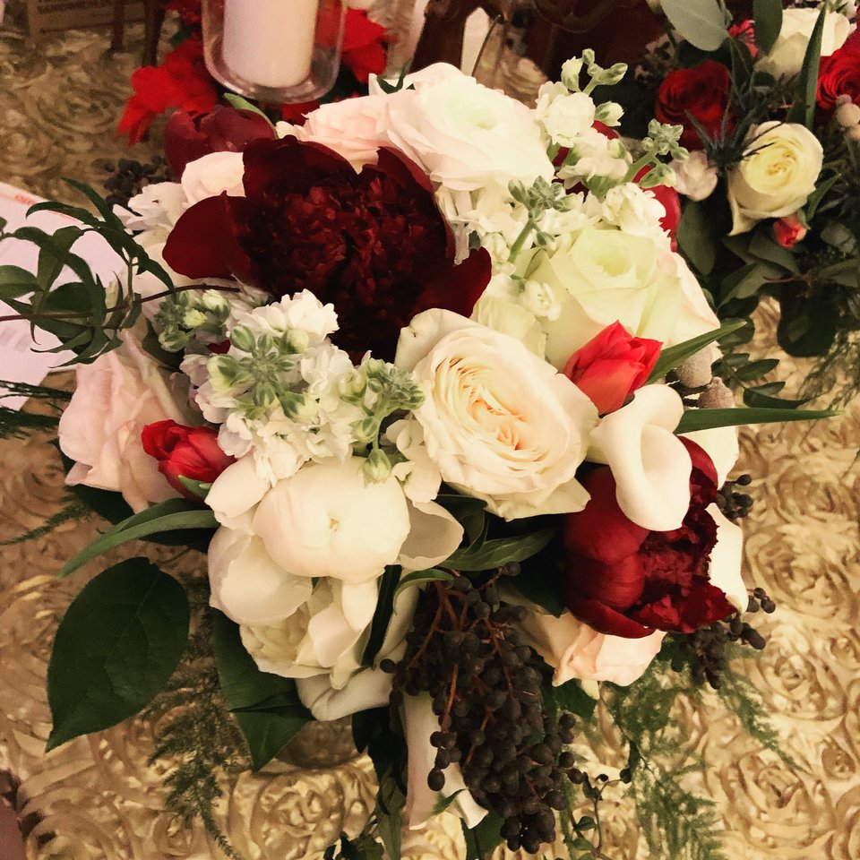 Burgundy and white roses with peonies