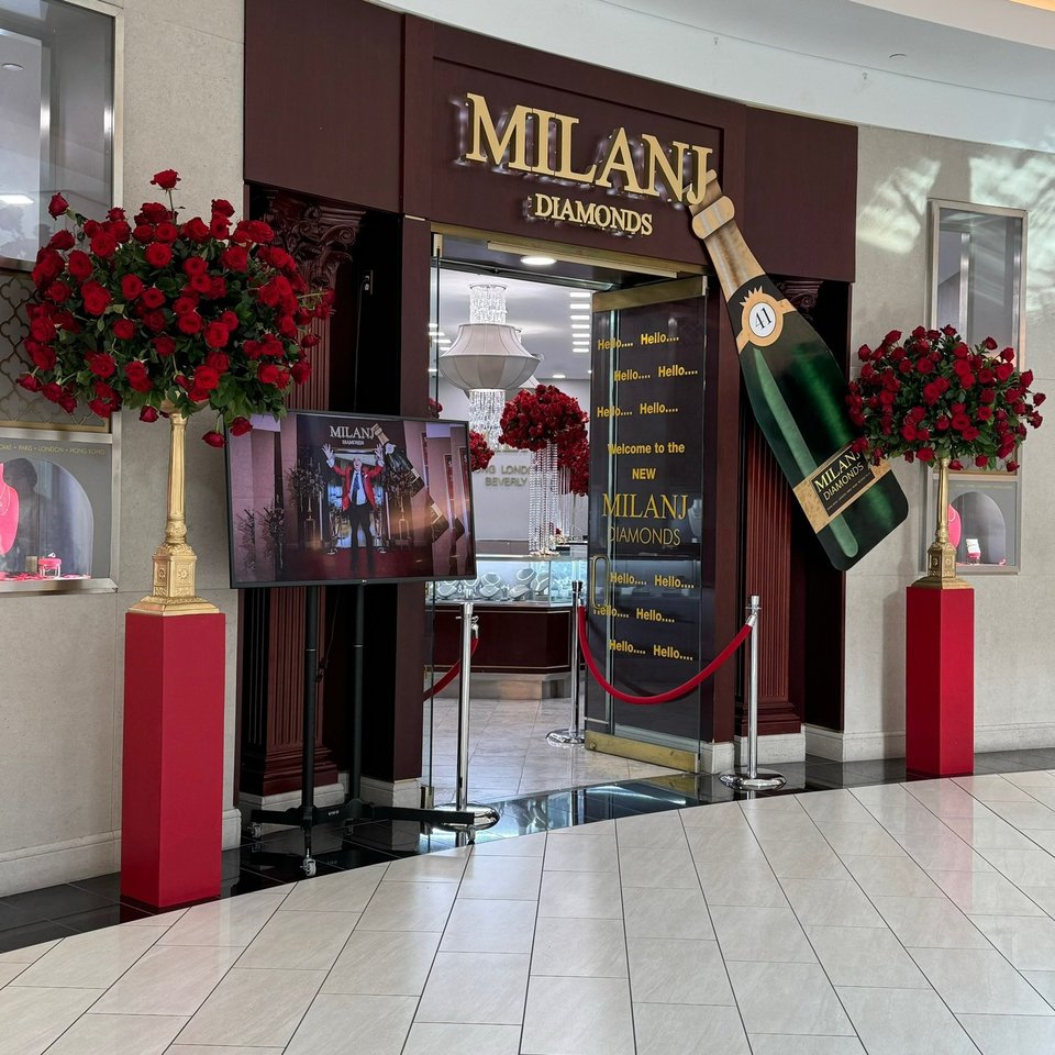 Milanj Diamonds storefront with red rose arrangements